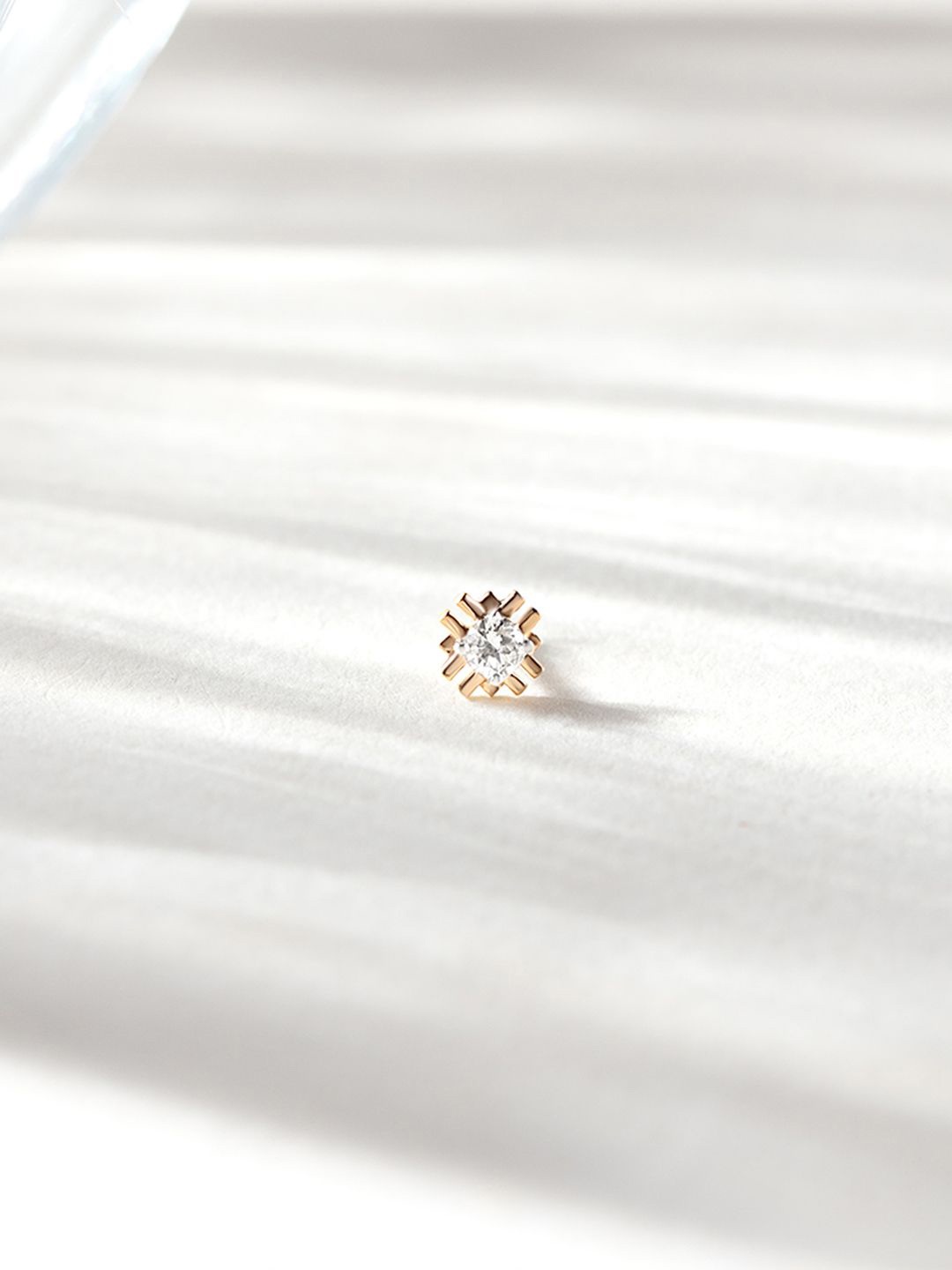 

Mia by Tanishq 14KT Nose Pin Diamond - 0.36 g, Yellow
