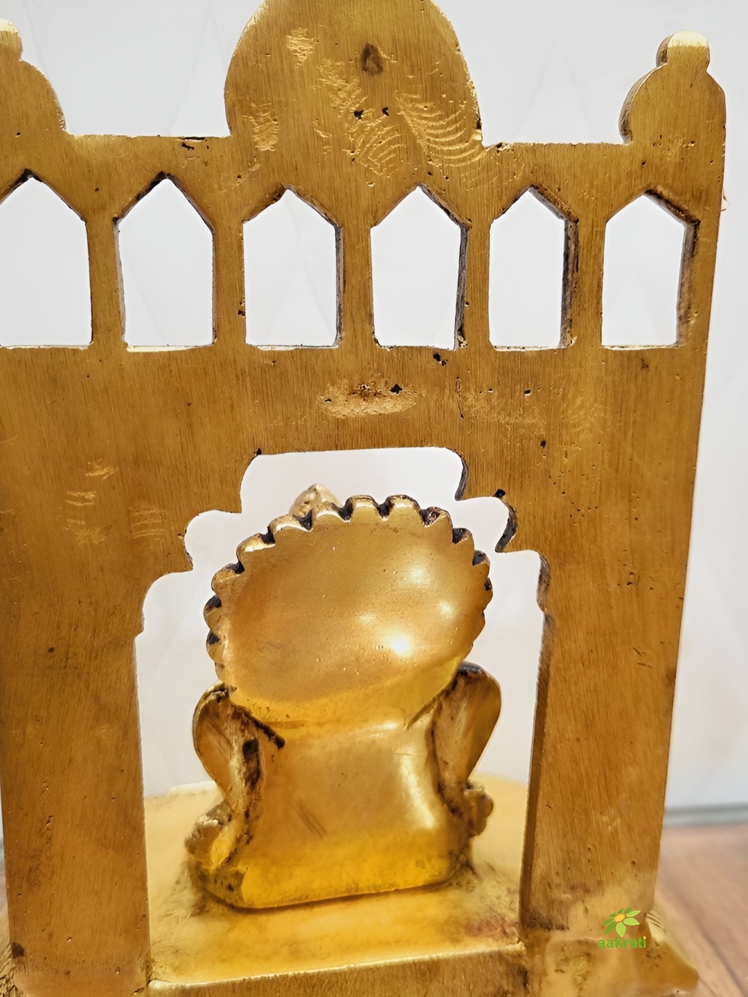 

Aakrati Yellow Religious Idol Showpiece