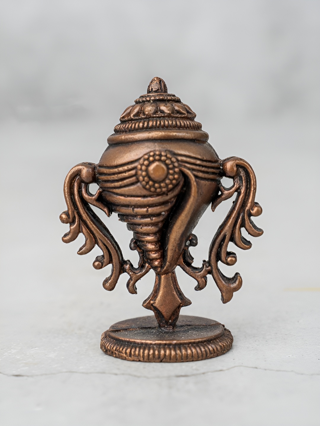 

The Advitya Copper-Toned Religious Figurine Showpiece