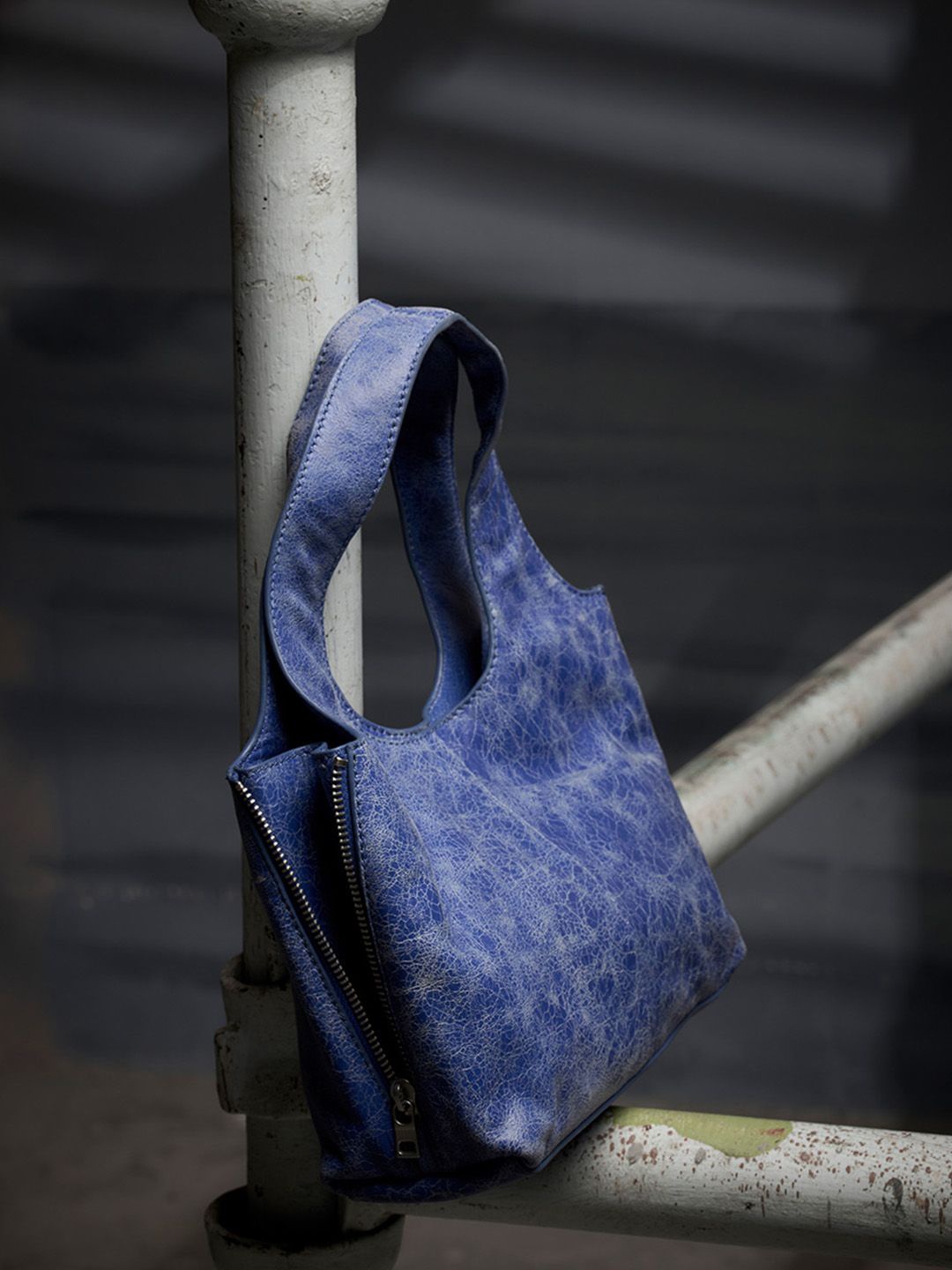 

the Misnomer Unisex Textured Leather Mini Handheld Bag, Blue