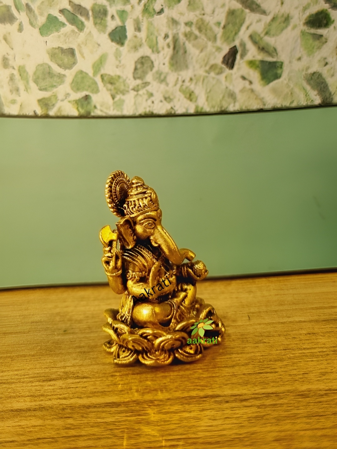 

Aakrati Yellow Religious Idol Showpiece