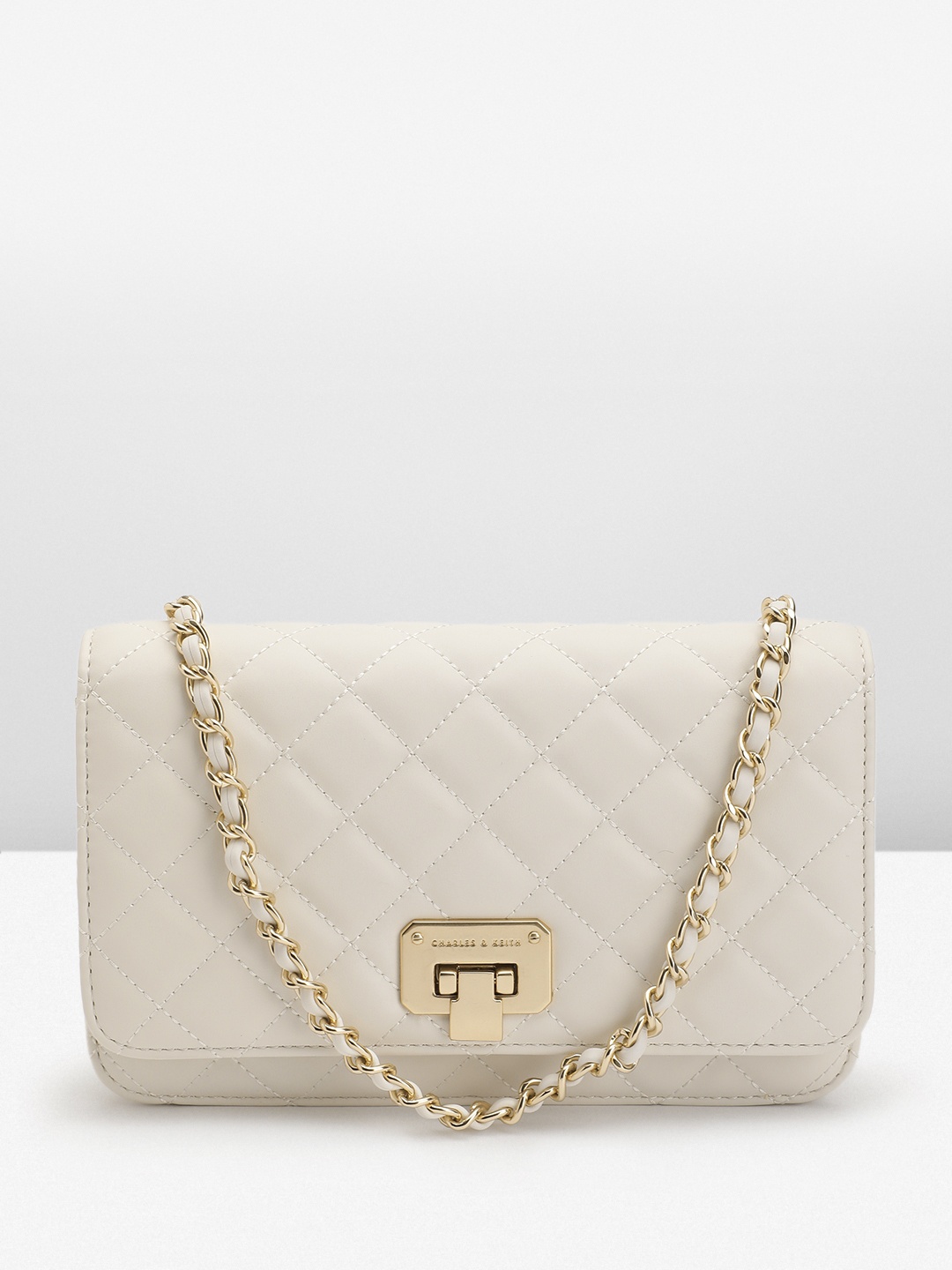 

CHARLES & KEITH PU Structured Sling Bag with Quilted, Cream