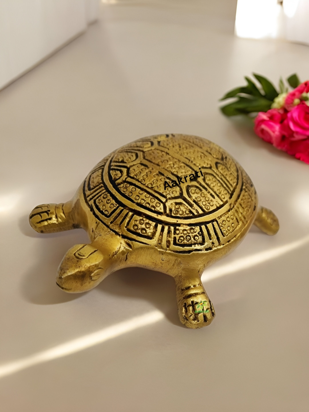 

Aakrati Yellow Figurine Showpiece