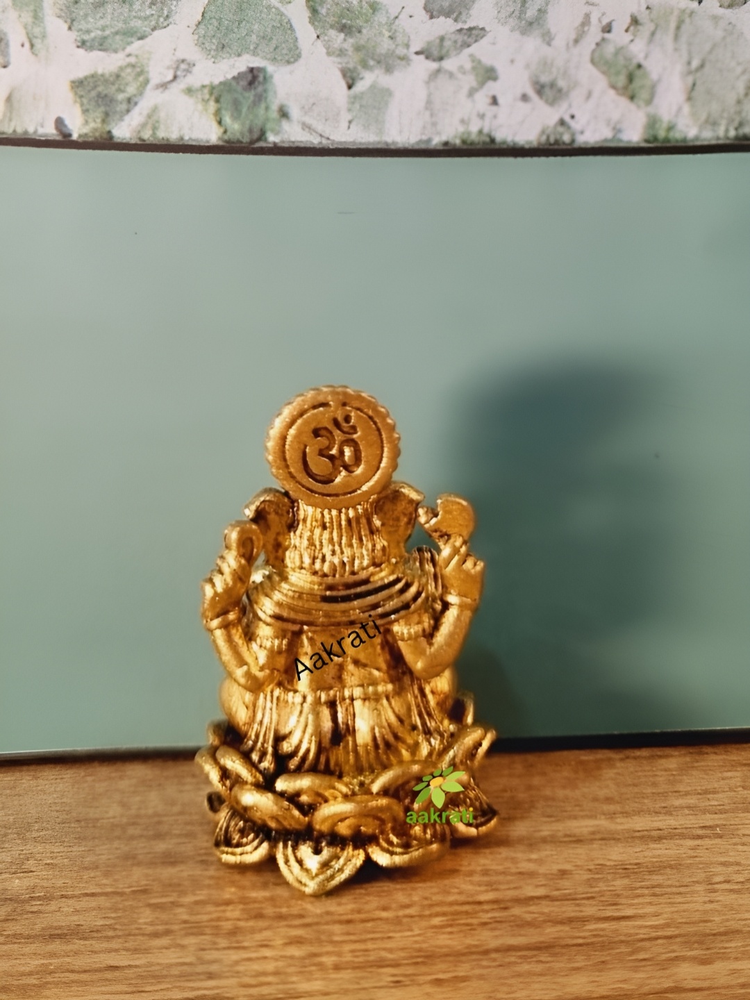 

Aakrati Yellow Religious Idol Showpiece