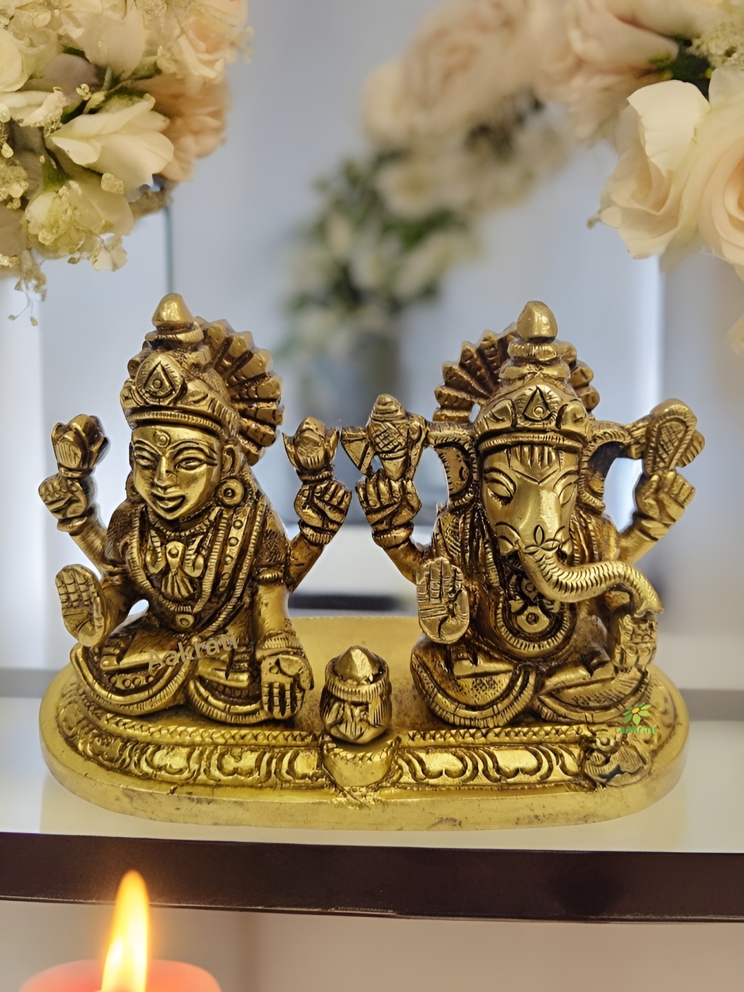 

Aakrati Gold-Toned Laxmi Ganesh Religious Idol Showpiece