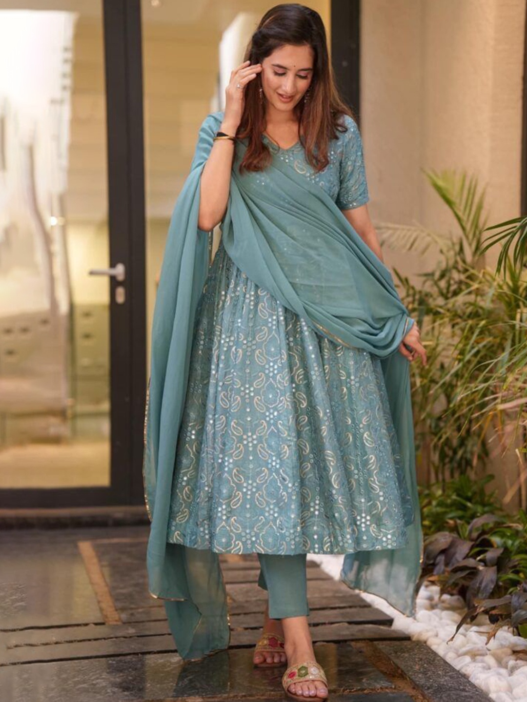 

Vama Heritage Women Ethnic Motifs Printed Pleated Sequinned Silk Georgette Kurta with Trousers & With Dupatta, Turquoise blue