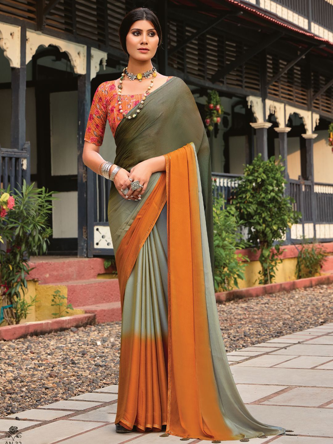 

Panzora Colourblocked Beads and Stones Poly Chiffon Saree, Orange