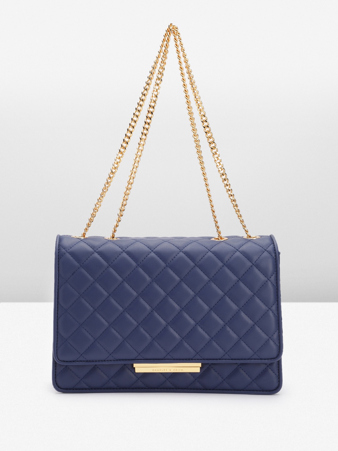 

CHARLES & KEITH Quilted Structured Sling Bag, Navy blue