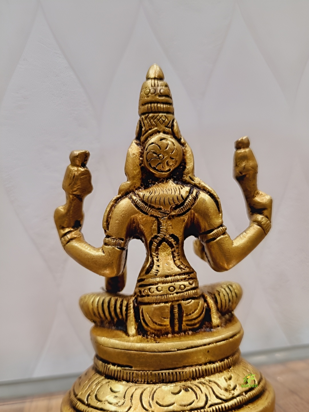 

Aakrati Yellow Religious Idol Showpiece