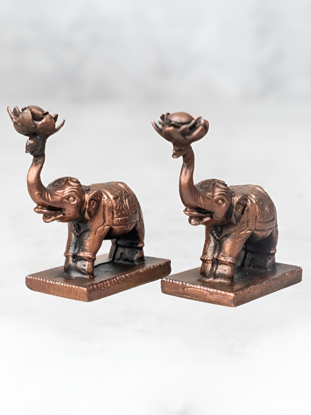 

The Advitya Copper-Toned Religious Figurine Showpiece
