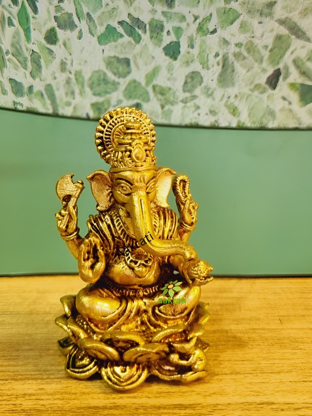 

Aakrati Yellow Lord Ganesha Idol Brass Showpiece, Gold