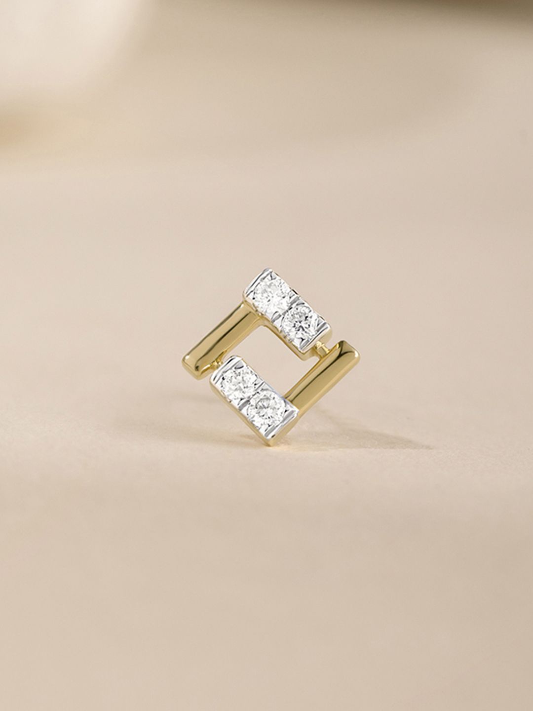 

Mia by Tanishq 14KT Nose Pin Diamond - 0.58 g, Yellow