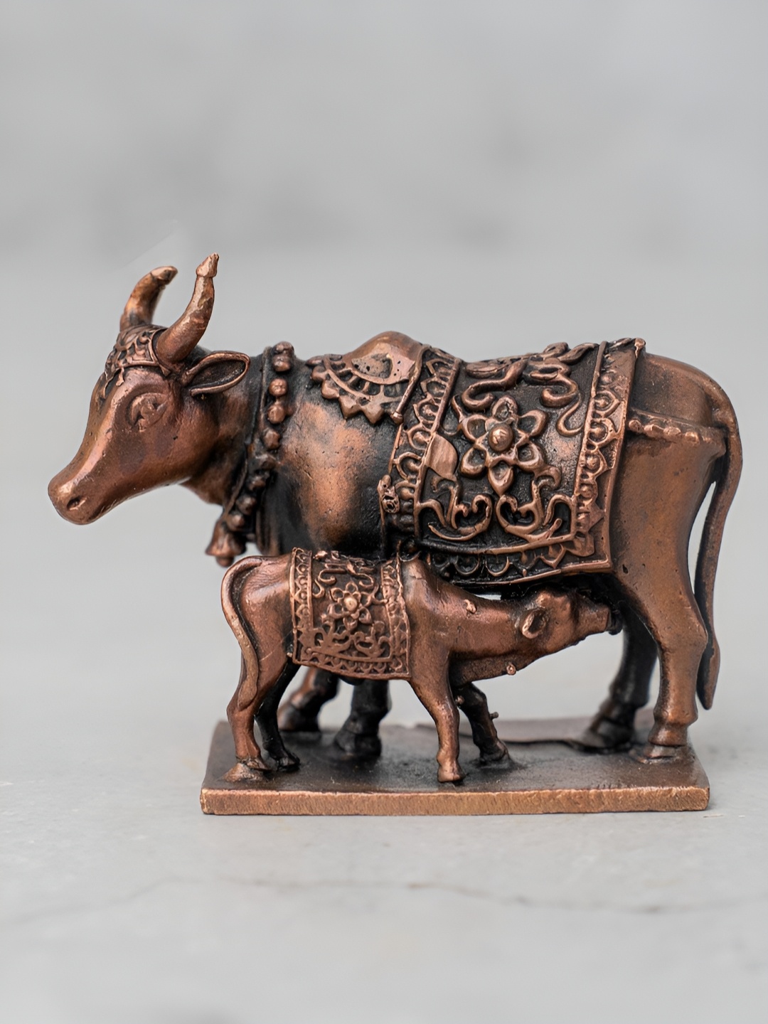 

The Advitya Copper-Toned Religious Figurine Showpiece