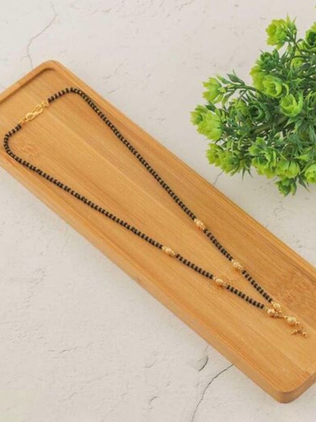 

Wynona Gold-Plated Artificial Stones and Beads Mangalsutra