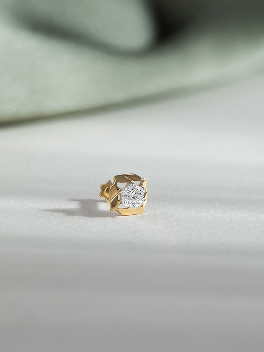 

Mia by Tanishq 14KT Nose Pin Diamond - 0.38 g, Yellow