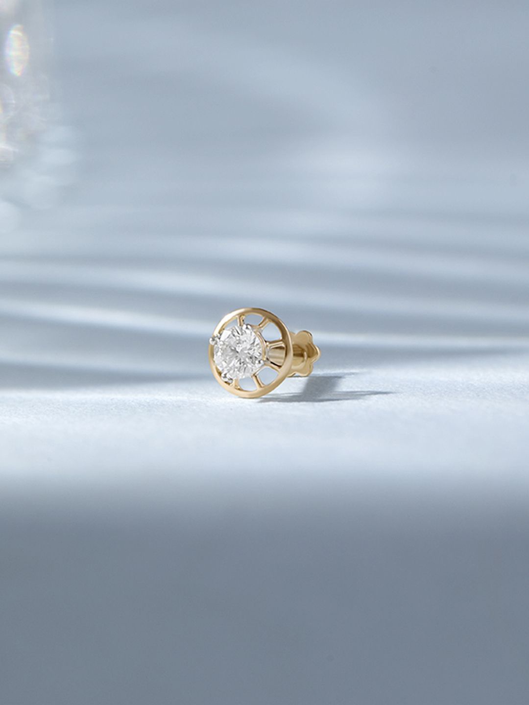 

Mia by Tanishq 14KT Nose Pin Diamond - 0.28g, Yellow