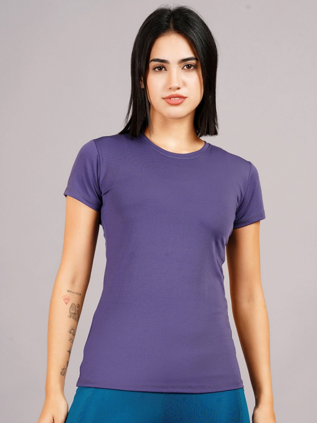 

NEVER LOSE Women Solid Compression T-shirt, Purple