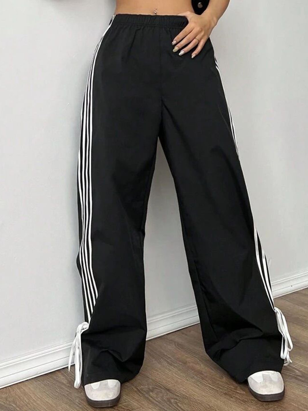 

SAAHASAM Women Striped Relaxed Loose Fit Trousers, Black