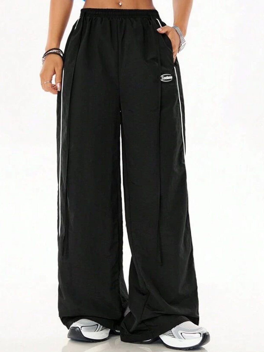 

SAAHASAM Women Striped Relaxed Loose Fit Trousers, Black