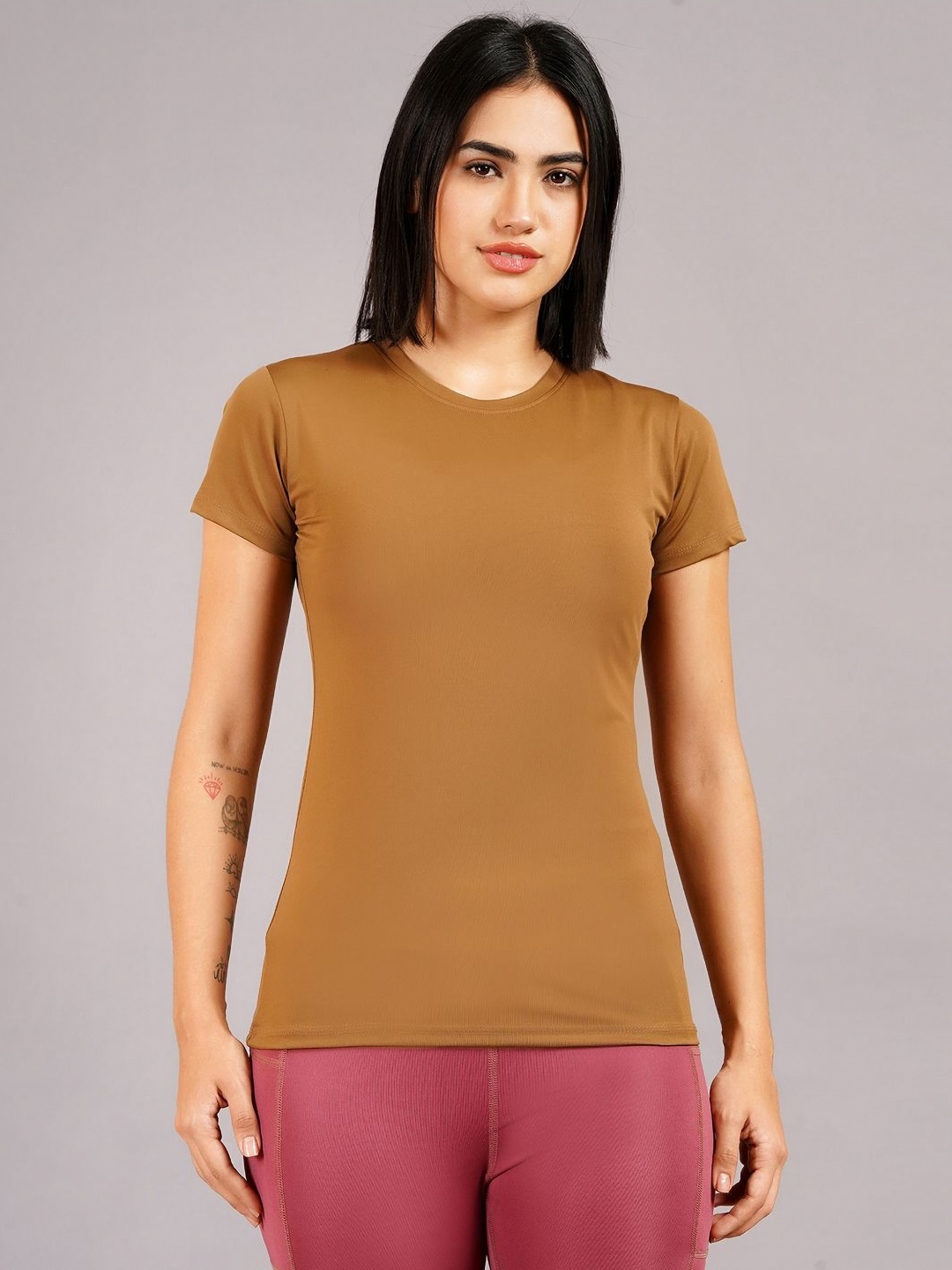 

NEVER LOSE Women Solid Compression T-shirt, Bronze