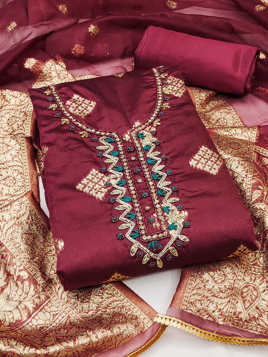 

Maroosh Geometric Woven Design Beads Work Unstitched Dress Material, Maroon