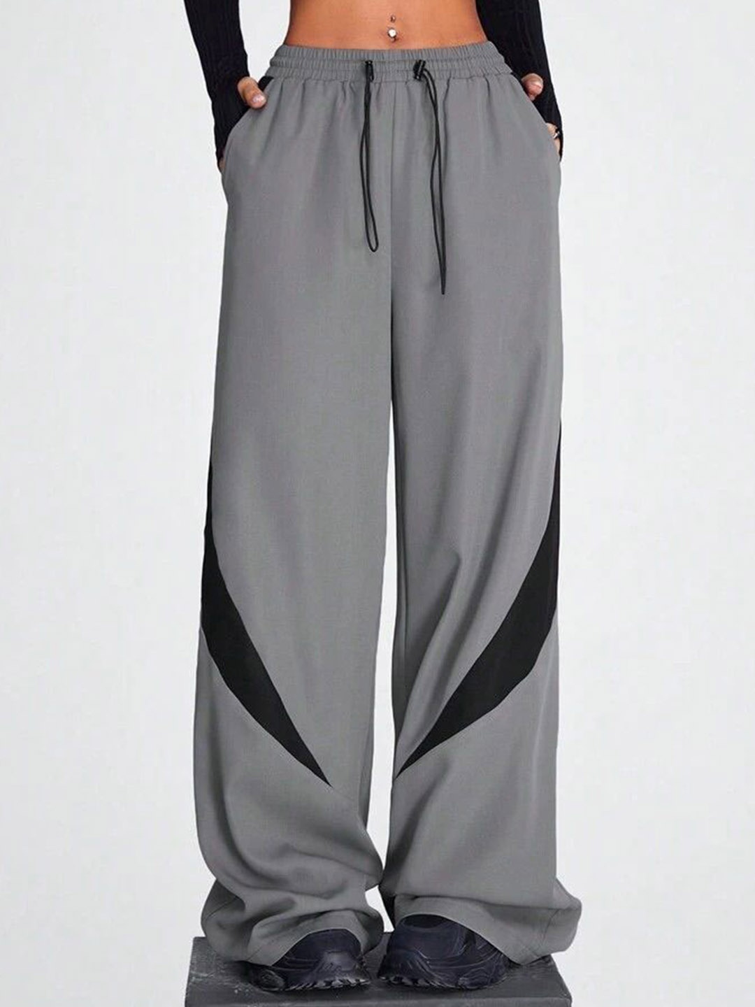 

SAAHASAM Women Striped Relaxed Loose Fit Trousers, Grey