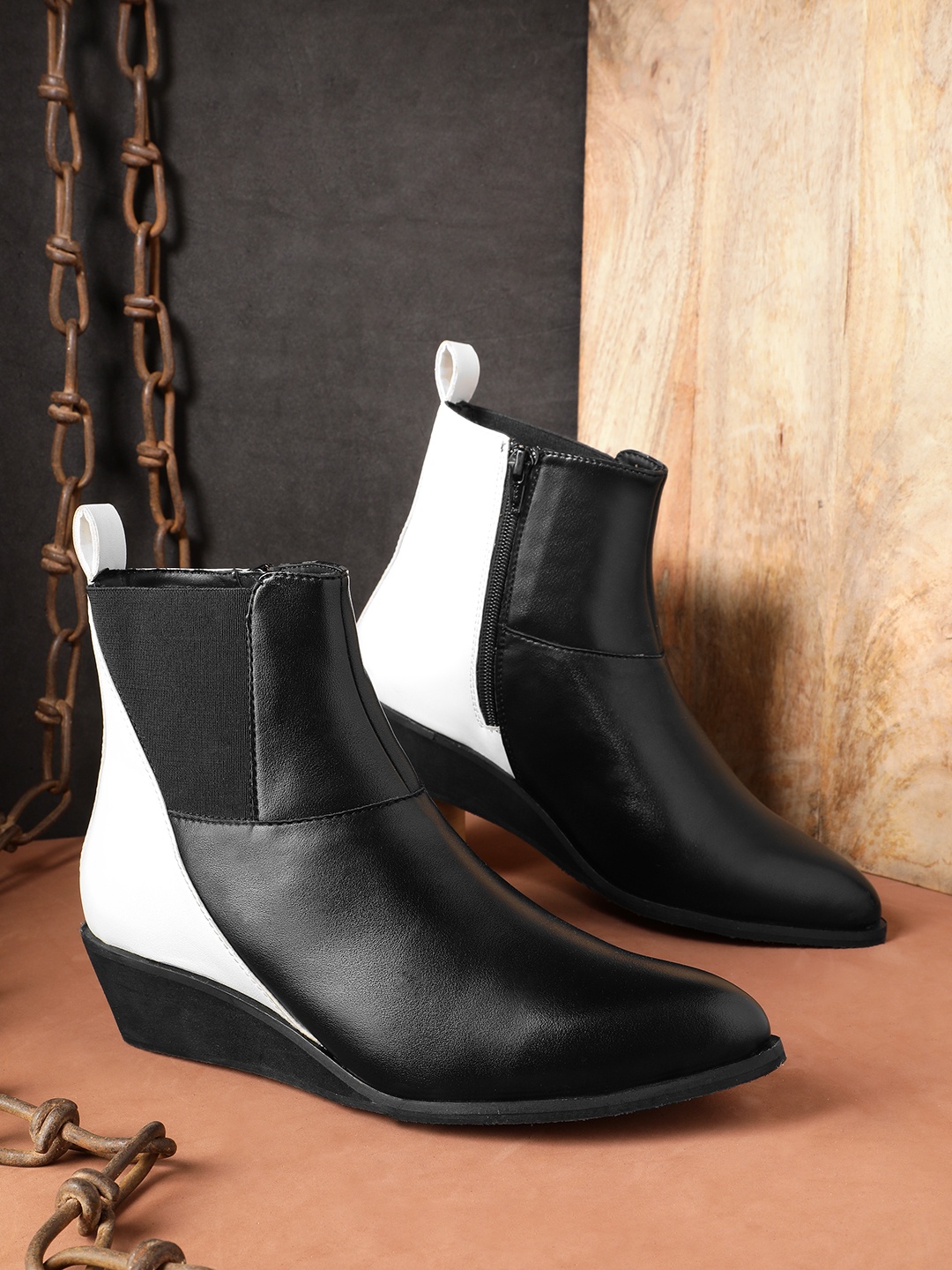 

Roadster The Lifestyle Co. Women Colourblocked Wedge Heel Regular Boots, Black