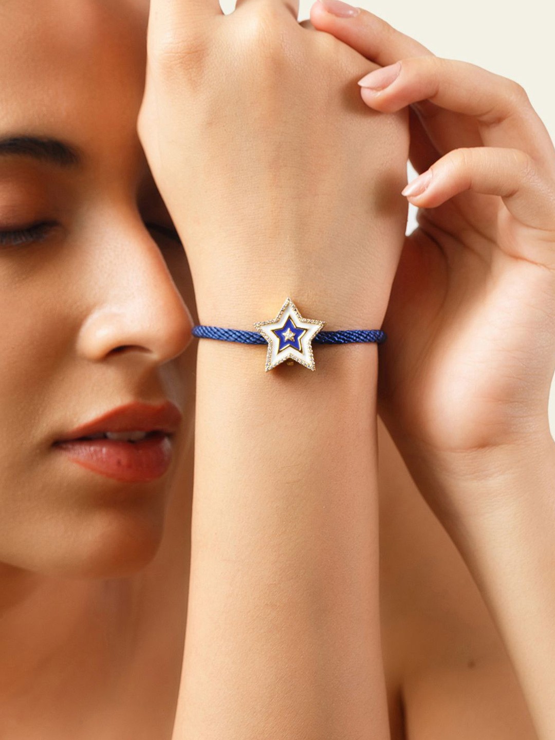 

Isharya Blue Star Gold Plated Artificial Stones Studded Enamelled Wraparound Bracelet