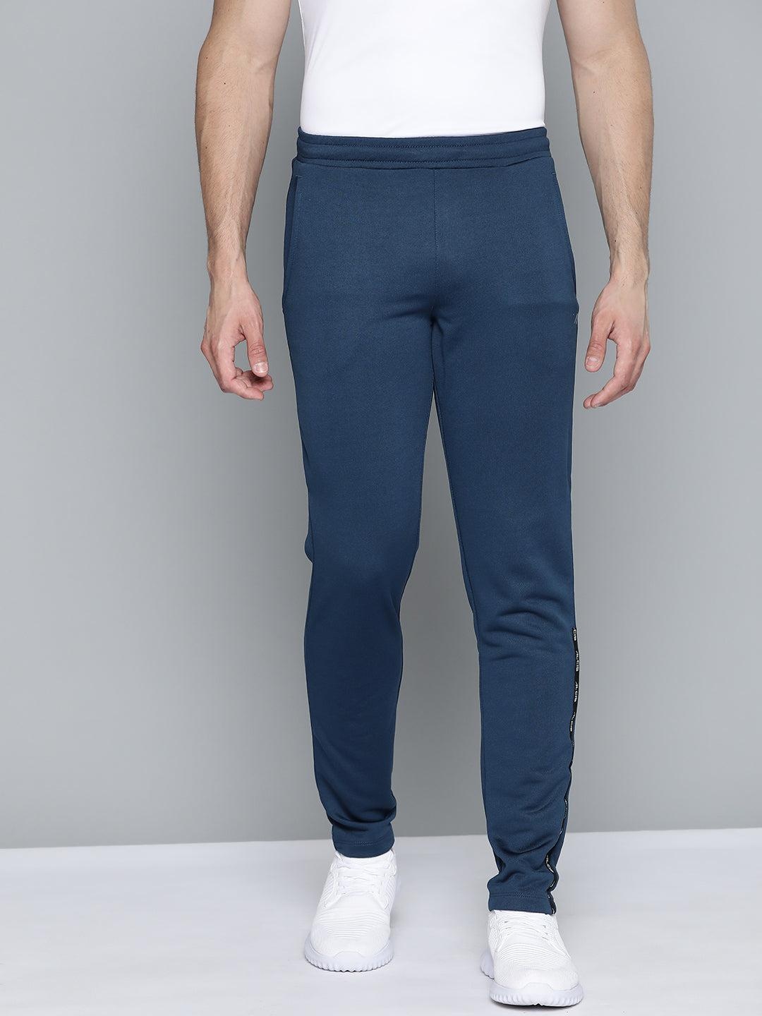

Alcis Men Slim Fit Solid Training Track Pants, Blue