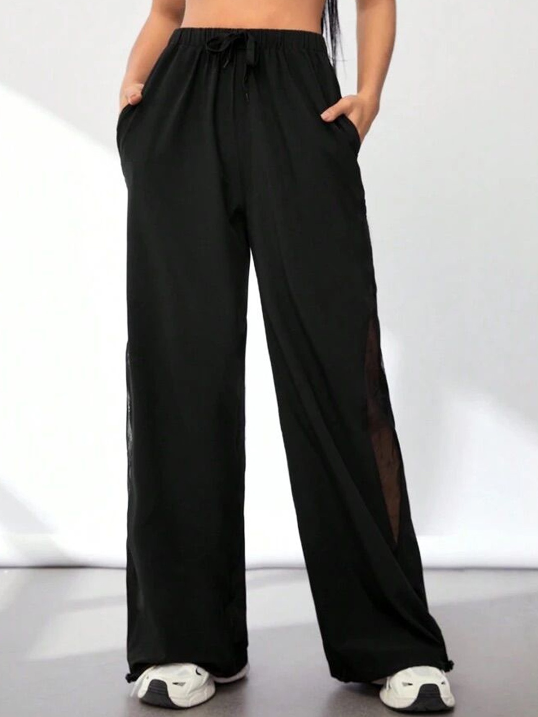

SAAHASAM Women Striped Relaxed Loose Fit Trousers, Black