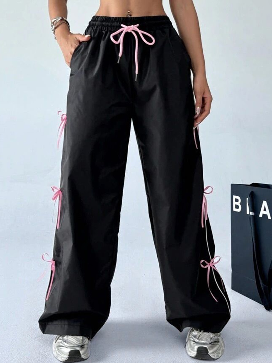 

SAAHASAM Women Striped Relaxed Loose Fit Trousers, Black