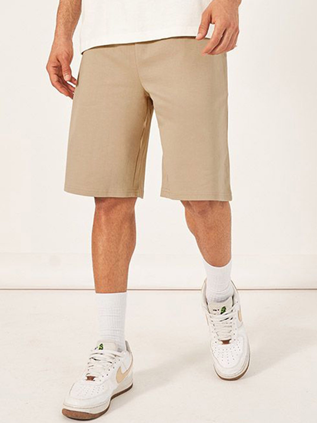 

Styli Men Oversized Solid Shorts with Drawstring Closure, Beige