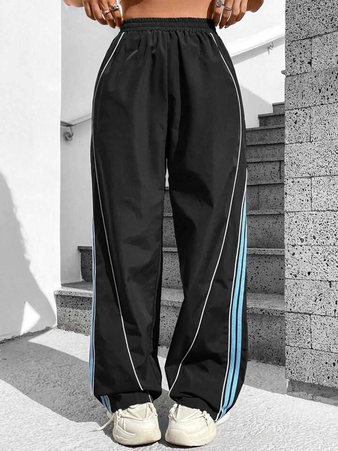 

SAAHASAM Women Striped Relaxed Loose Fit Trousers, Black