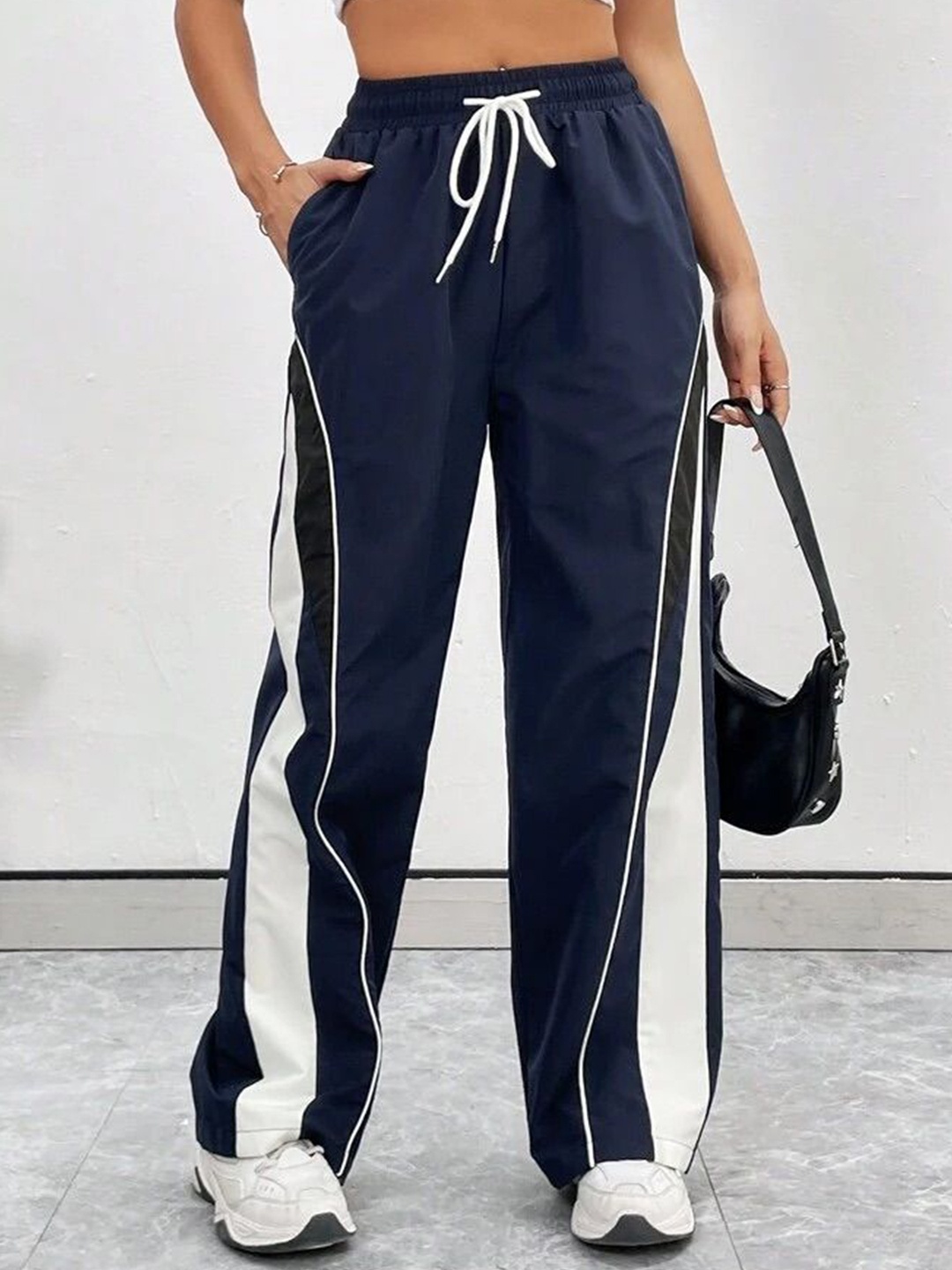 

SAAHASAM Women Striped Relaxed Loose Fit Trousers, Navy blue