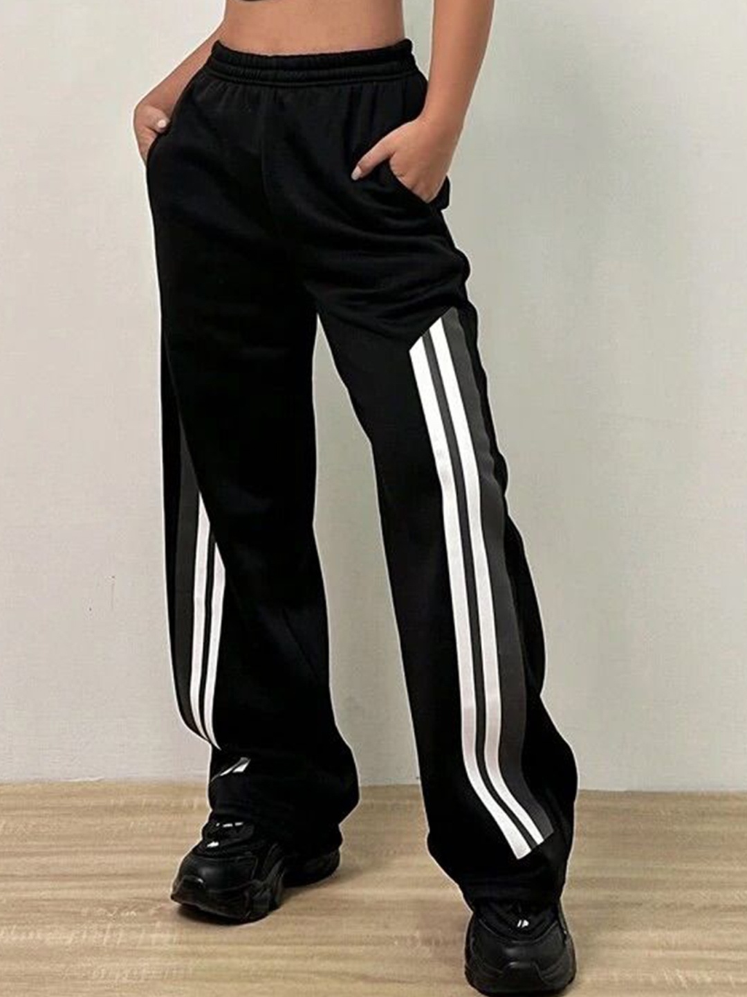 

SAAHASAM Women Striped Relaxed Loose Fit Trousers, Black