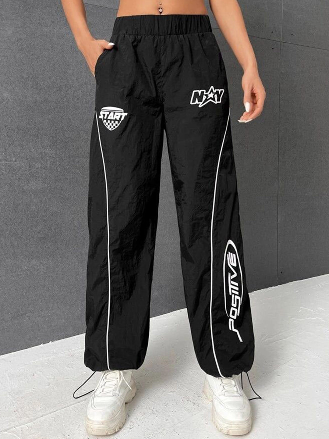 

SAAHASAM Women Striped Relaxed Loose Fit Trousers, Black