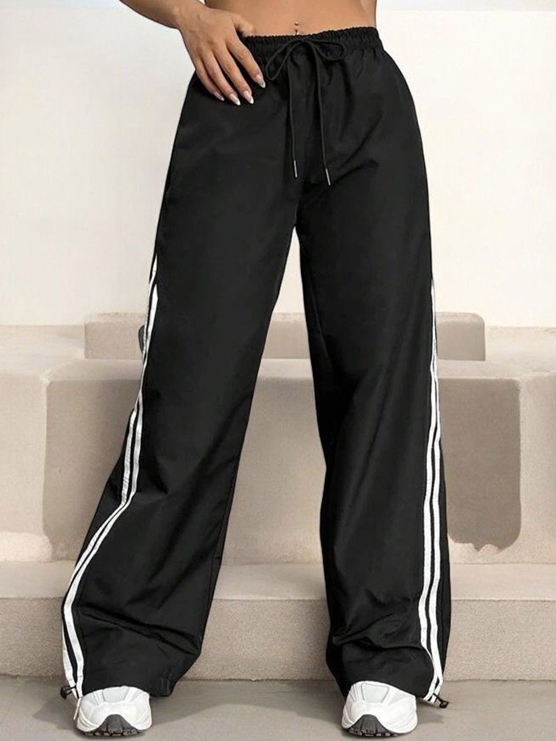 

SAAHASAM Women Striped Relaxed Loose Fit Trousers, Black