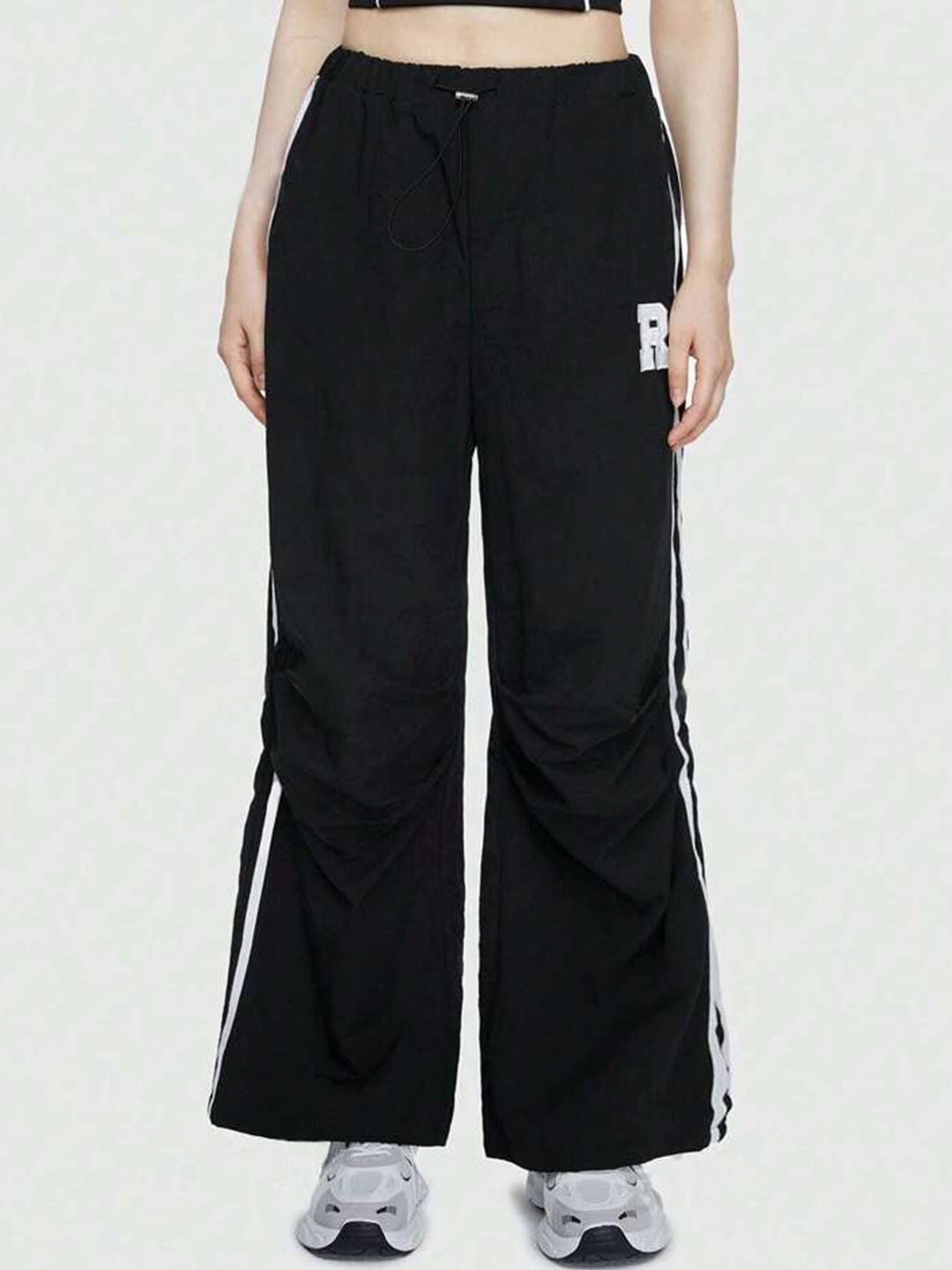 

SAAHASAM Women Striped Relaxed Loose Fit Trousers, Black
