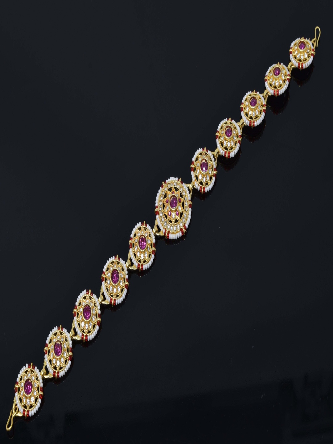 

MEIRA JEWELLERY Gold-Plated Artificial Stones Studded Matha Patti Head Jewellery