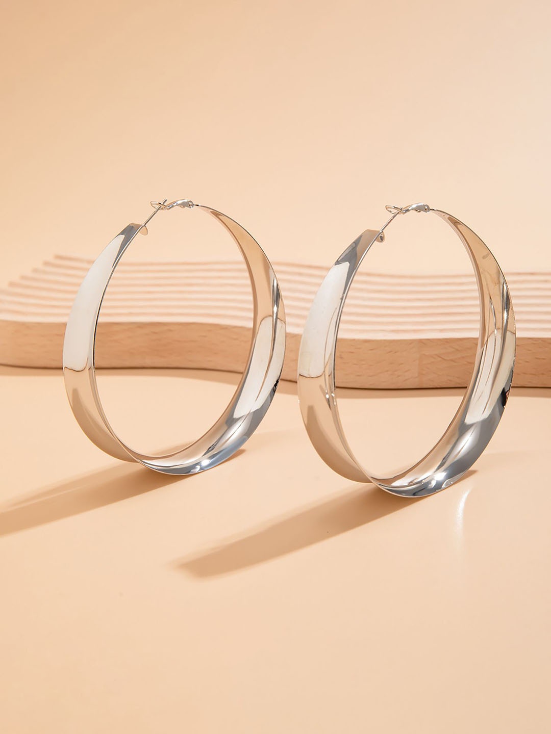 

StyleCast x Revolte Silver-Plated Circular Hoop Earrings