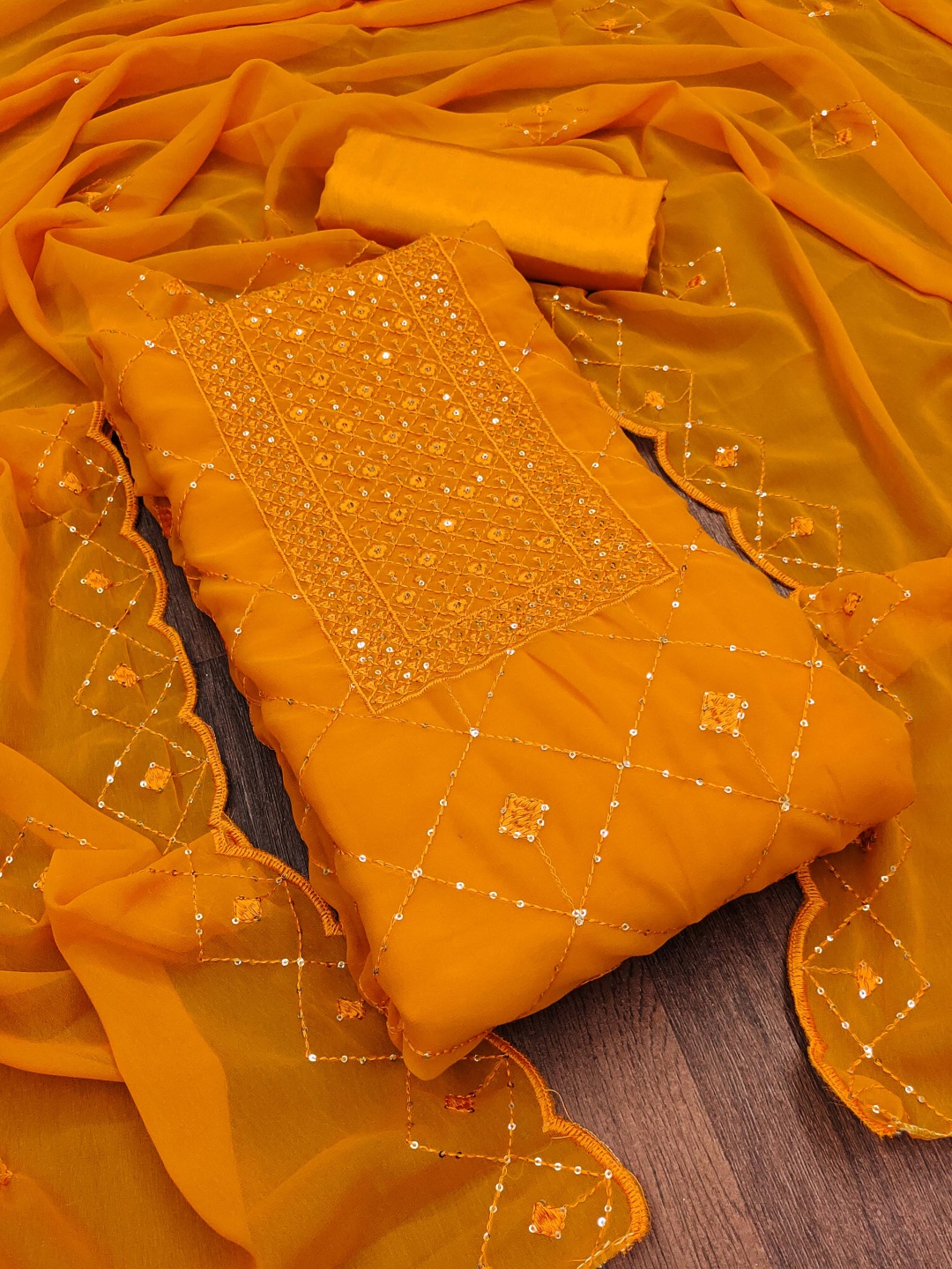 

Maroosh Geometric Embroidered Sequinned Unstitched Dress Material, Mustard