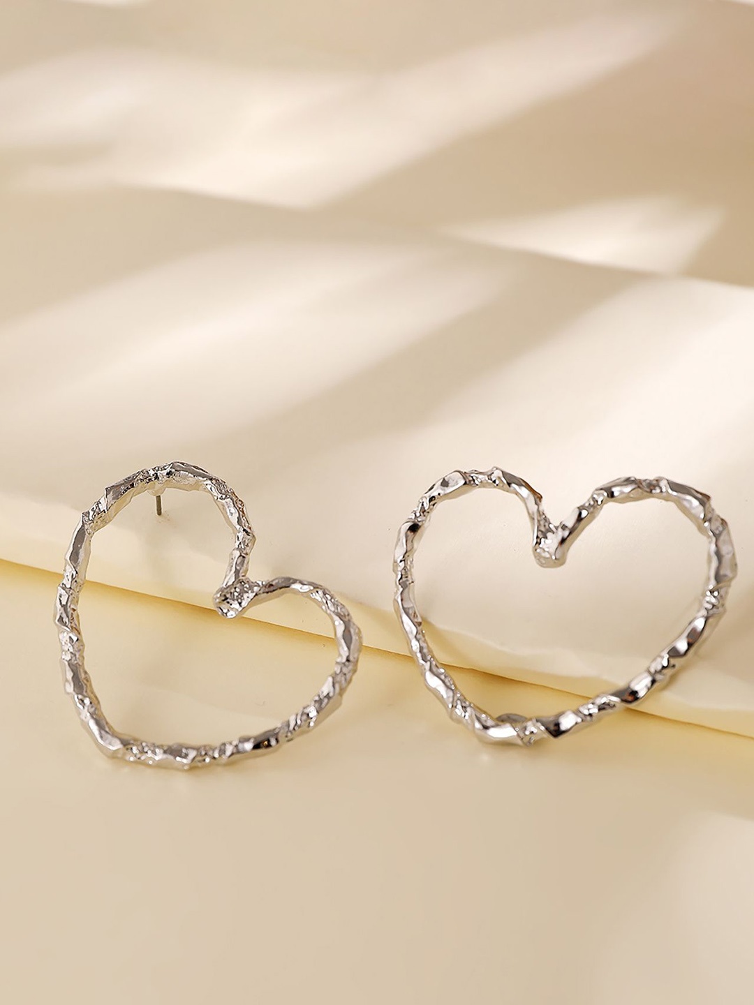 

StyleCast x Revolte Silver-Plated Heart Shaped Chunky Drop Earrings