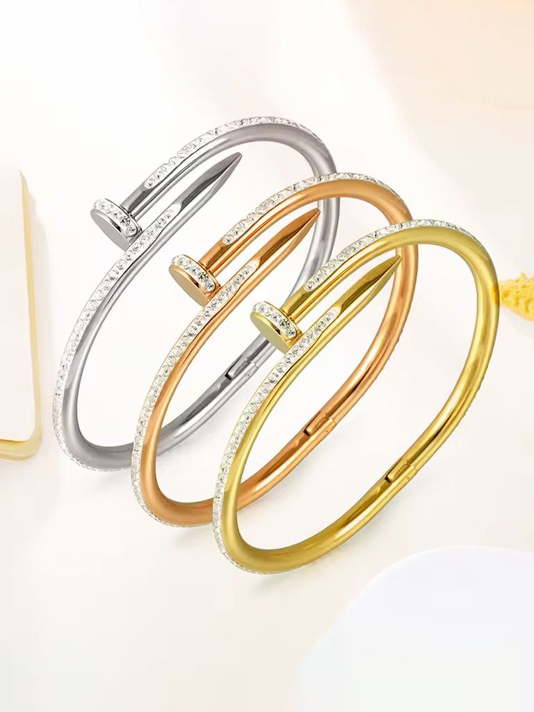 

DIVASTRI Set Of 3 Stainless Steel Gold-Plated American Diamond Studded Kada Bracelets