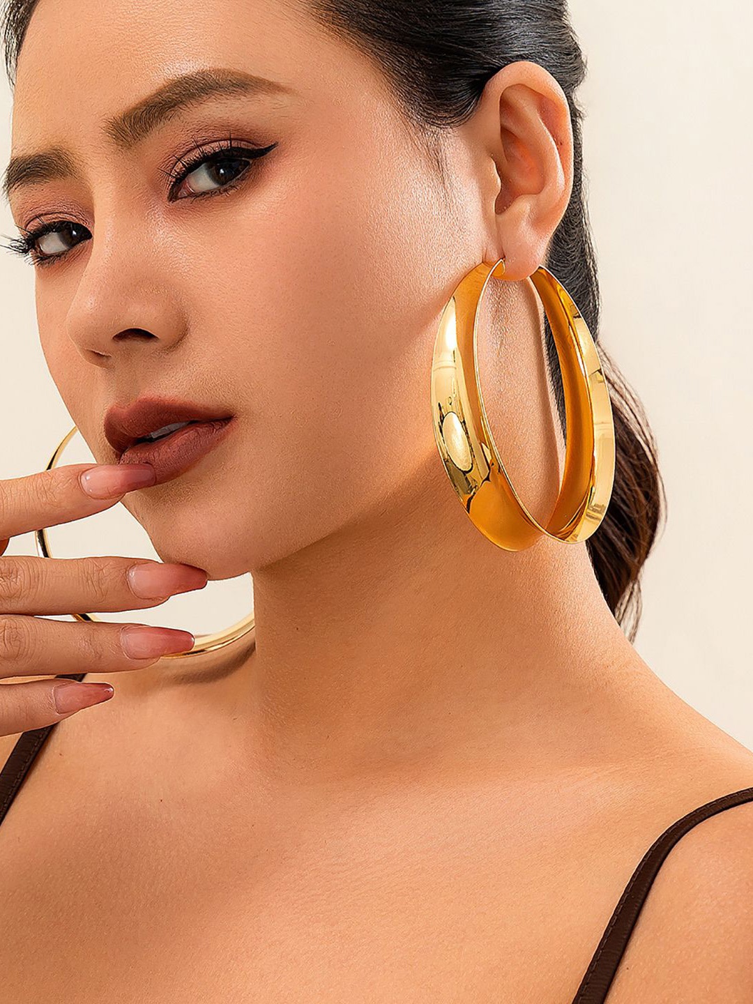 

StyleCast x Revolte Gold Plated Circular Hoop Earrings