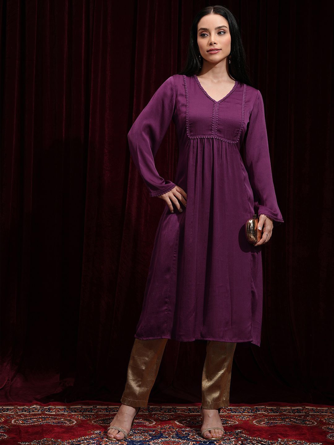 

Vishudh Embellished Curved V-Neck A Line Kurta, Magenta