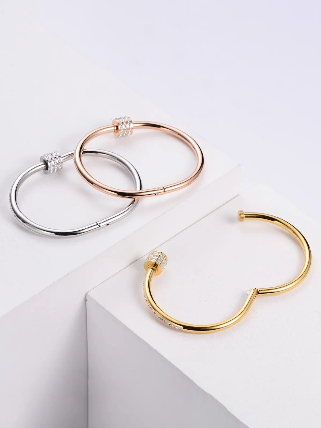 

DIVASTRI Set Of 3 Stainless Steel Gold-Plated American Diamond Studded Kada Bracelets