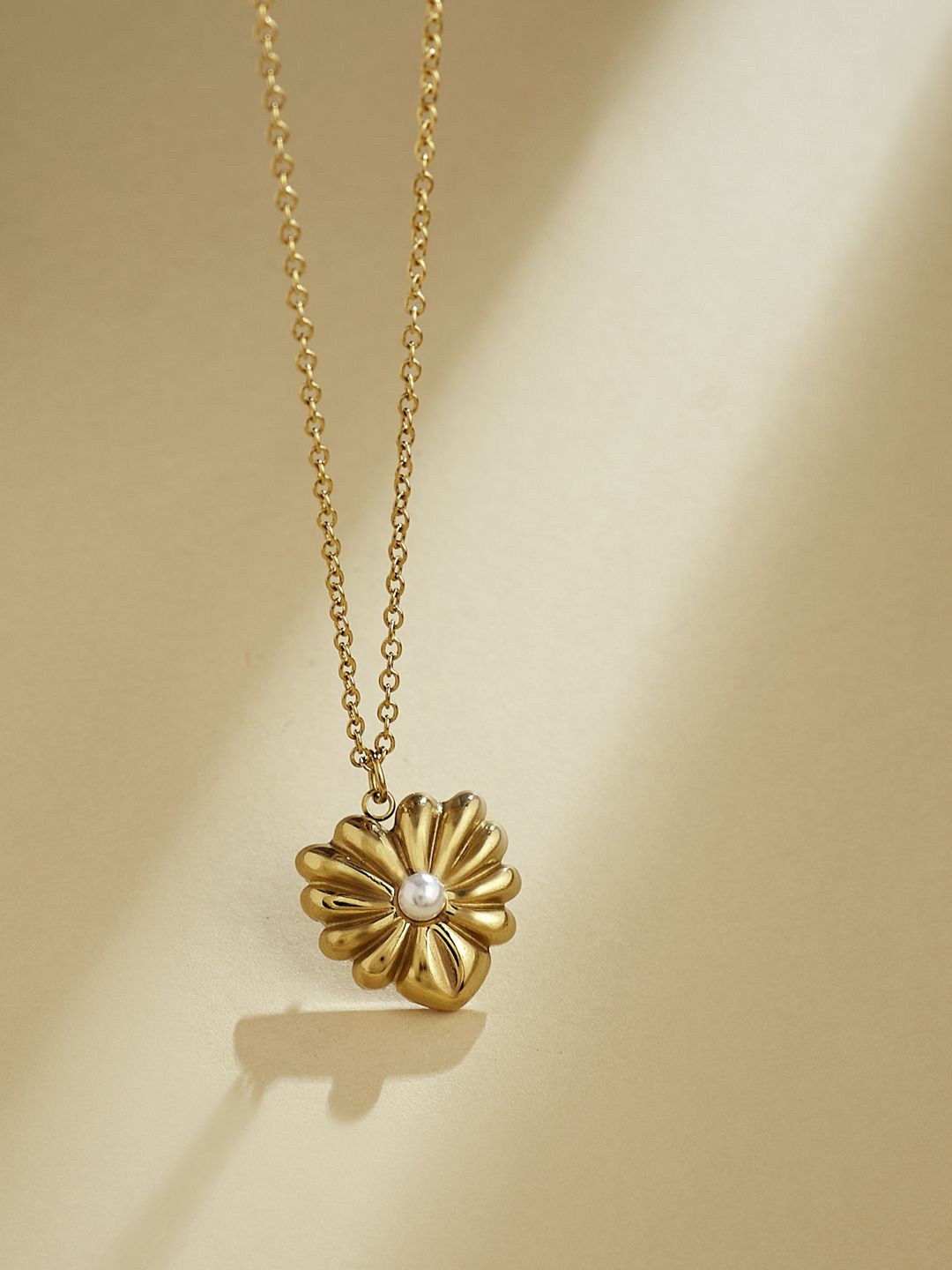 

Yinara Gold-Plated Beaded Charm Pendant With Chain