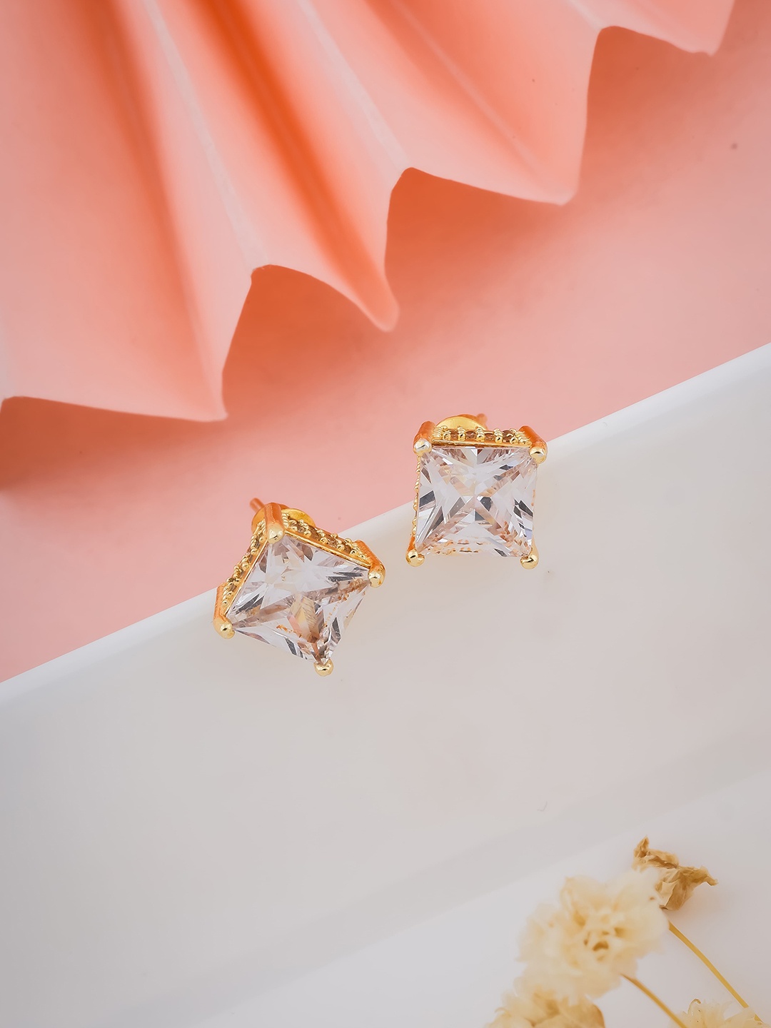 

Wynona Gold-Plated American Diamond Studded Contemporary Studs