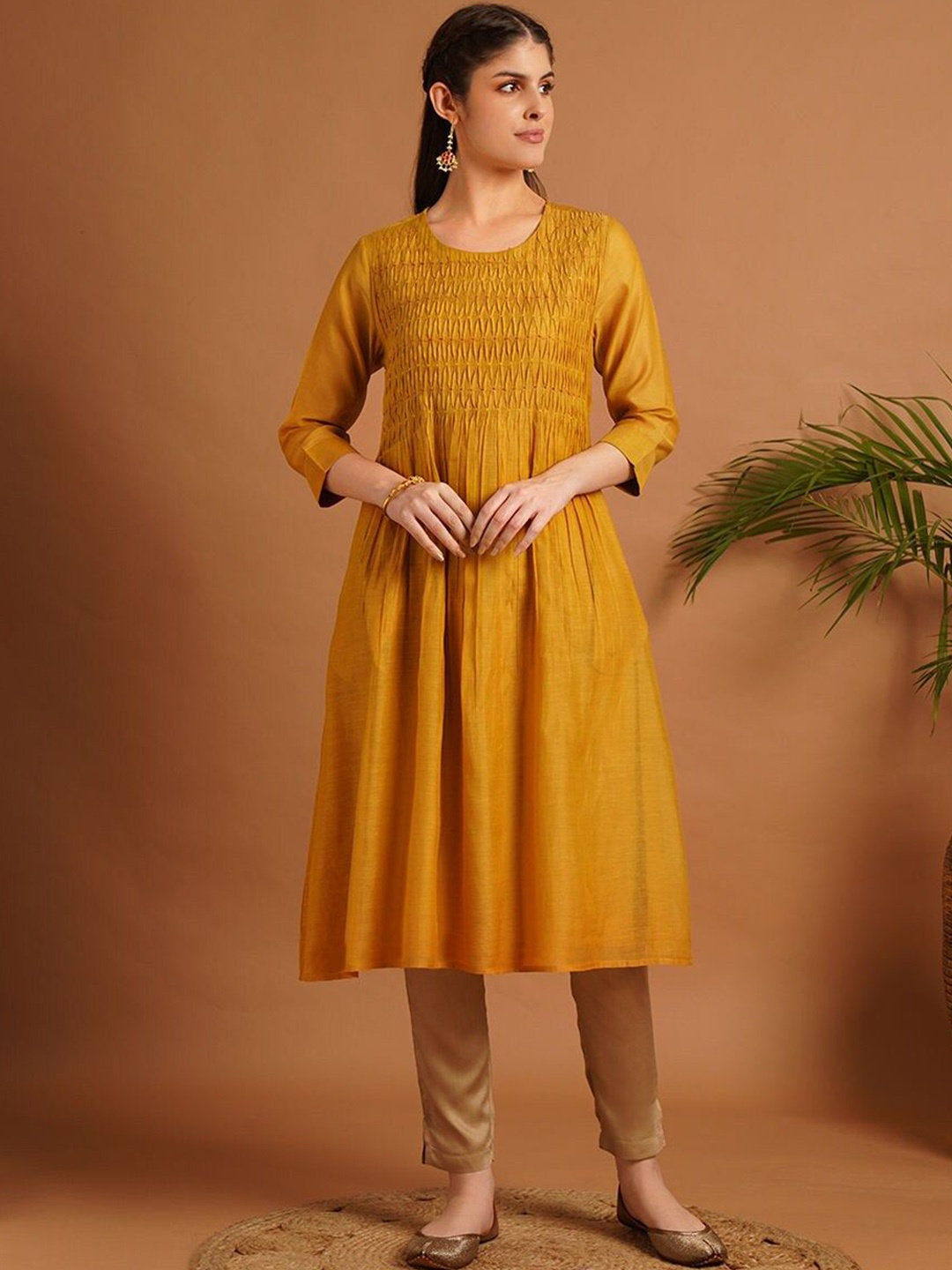 

JAYPORE Round Neck Yoke Design Pleated A-Line Cotton Silk Kurta, Mustard