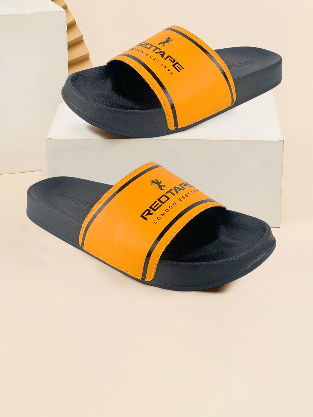 

Red Tape Women Printed Sliders, Yellow